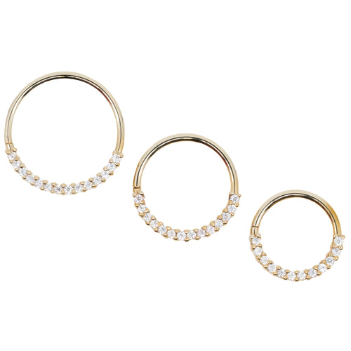 Three yellow gold seam rings with a row of 1mm white round prong set CZ's showing three different diameters.
