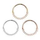 Three seam rings with half the ring consisting of 1mm round white CZ's in prong settings. One yellow gold, one white gold, and one rose gold.