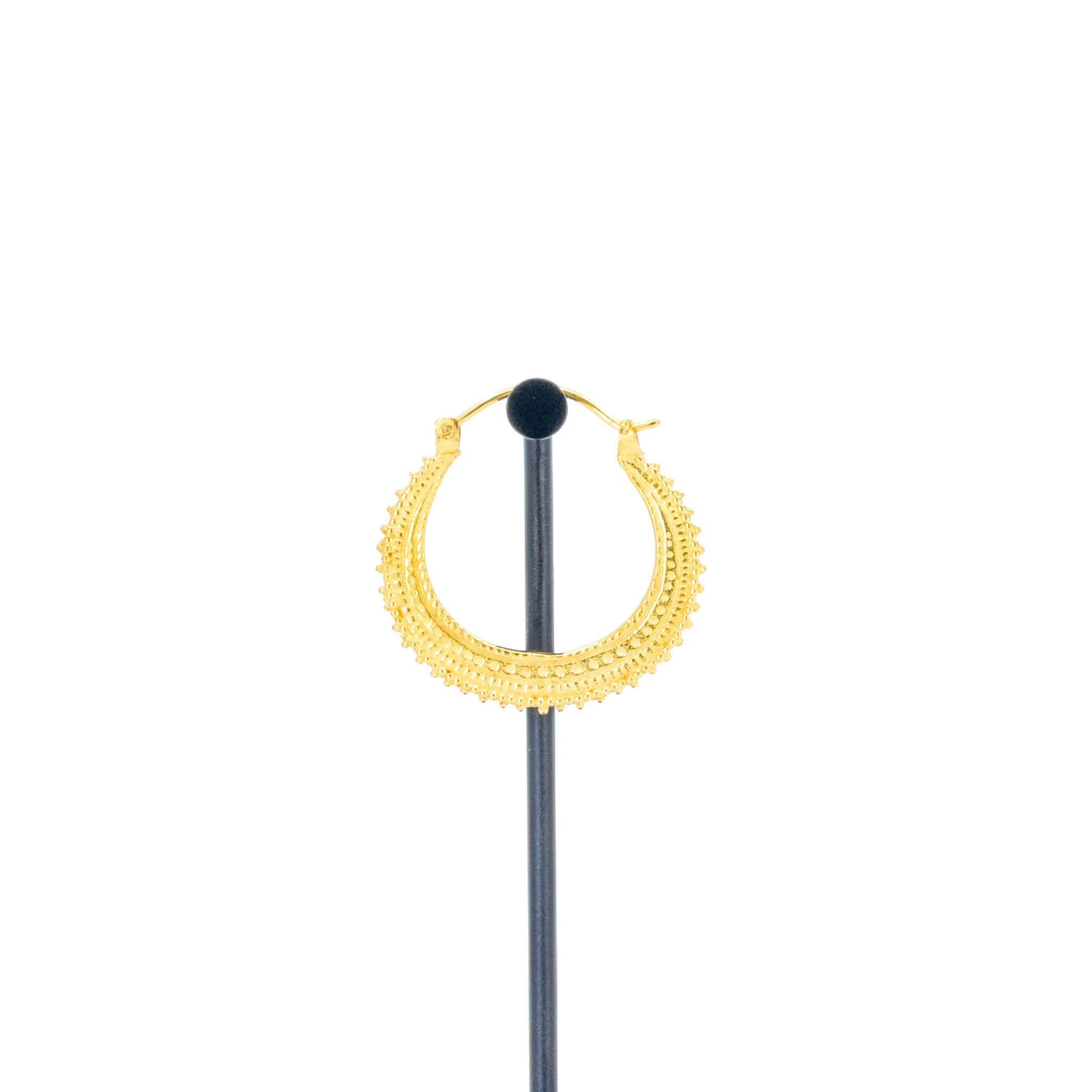 A single yellow gold plated earring with beaded accents.