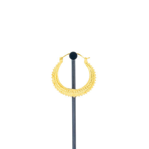 A single yellow gold plated earring with beaded accents.
