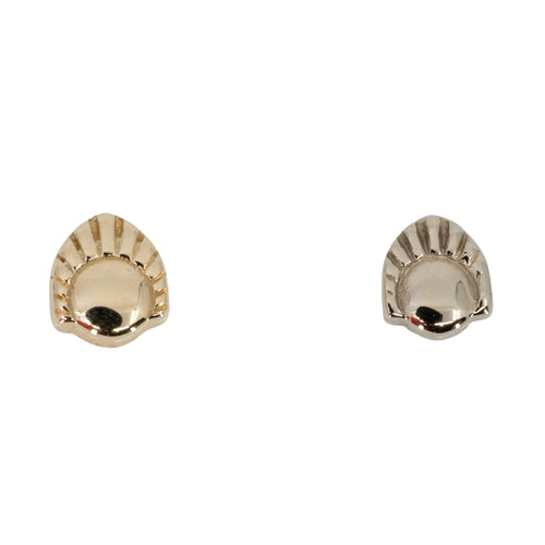 Two gold push pin earrings each with a low profile dome and a sunrise accent on two thirds of the dome. One in yellow gold and one in white gold.