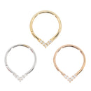 Three gold teardrop seam rings with five round white diamonds at the apex. One yellow gold, one white gold, and one rose gold.