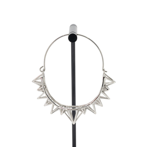 A single silver plated hoop earring with the decorative portion created by varying sizes of hollow triangles.