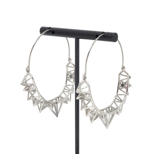 A pair of silver plated hoop earrings with the decorative portion created by varying sizes of hollow triangles.
