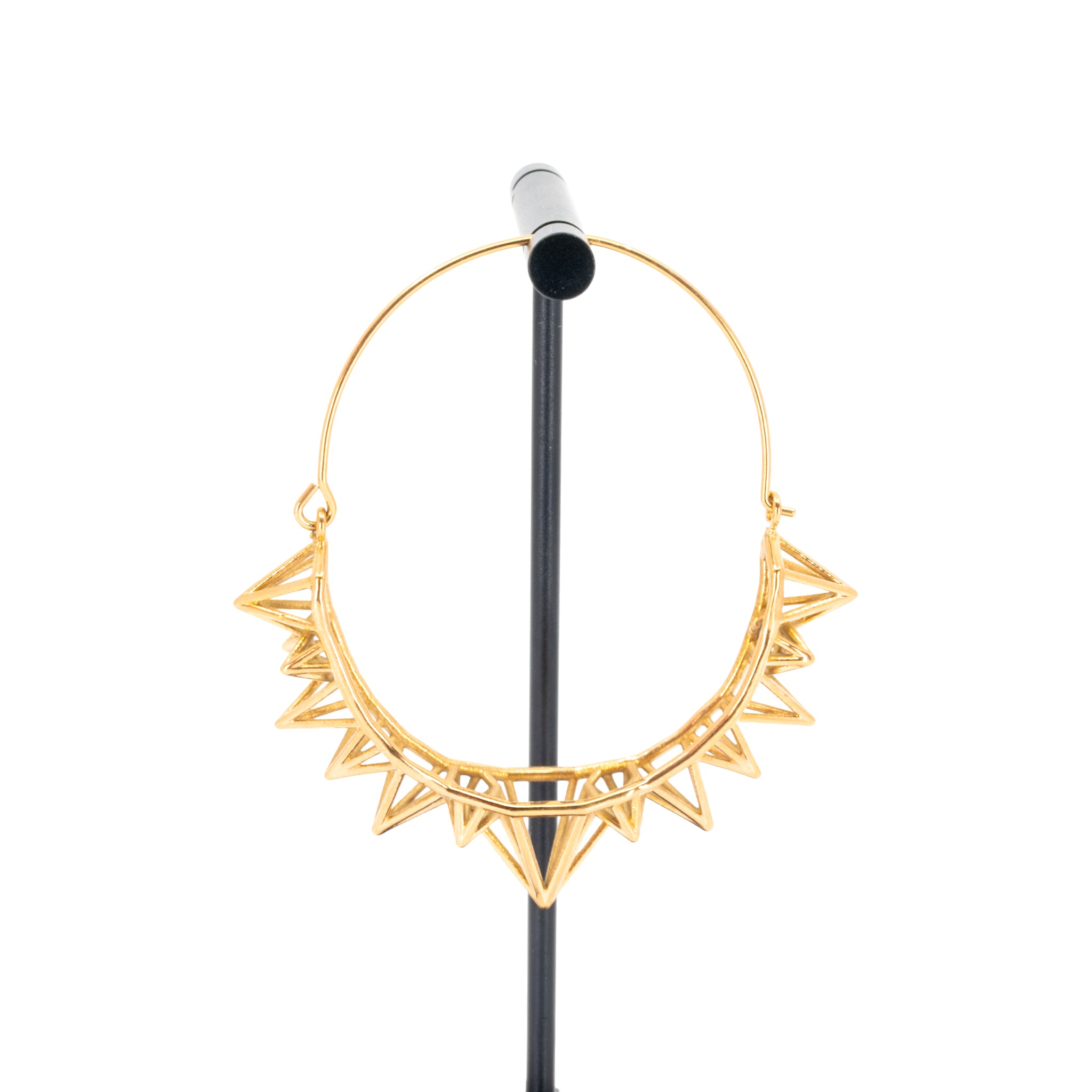 A single yellow gold plated hoop earring with the decorative portion created by varying sizes of hollow triangles.