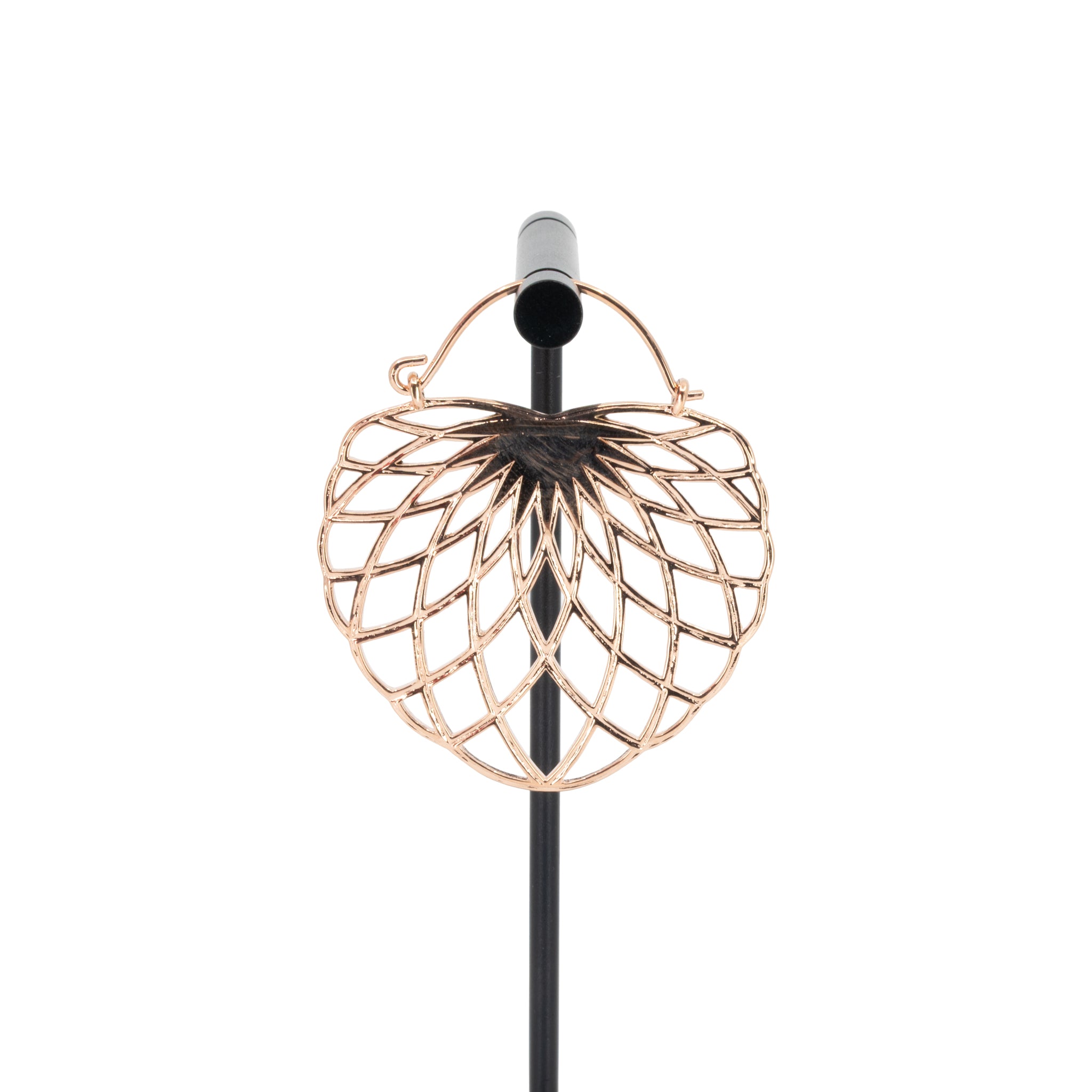 A single rose gold plated hoop earring with the decorative portion created with hollow overlapping tapered ovals creating a floral design.