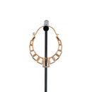 A single rose gold plated hoop earring with the decorative portion created with hollow rectangles and squares.