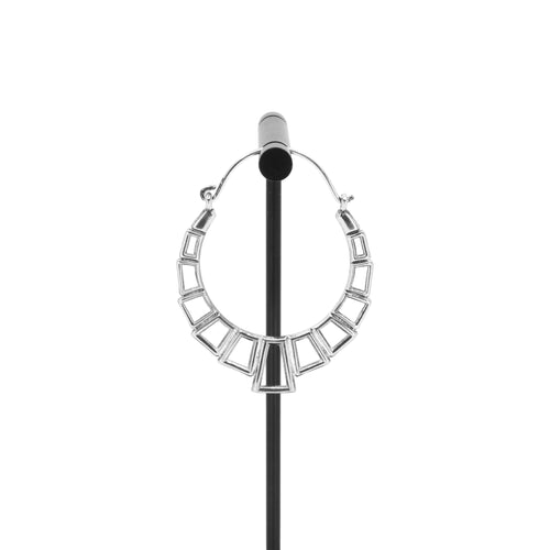 A single silver plated hoop earring with the decorative portion created with hollow rectangles and squares.