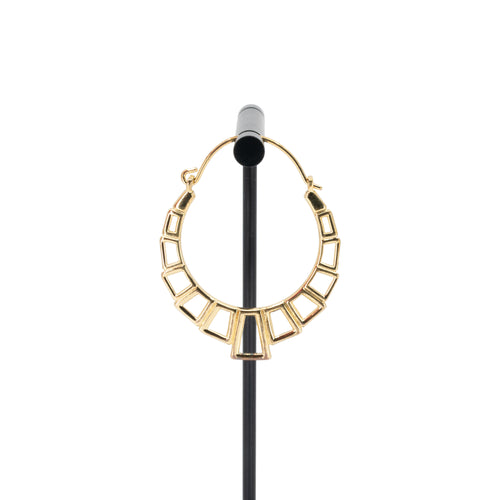 A single yellow gold plated hoop earring with the decorative portion created with hollow rectangles and squares.