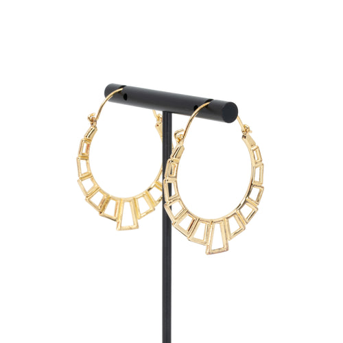 A pair of yellow gold plated hoop earrings with the decorative portion created with hollow rectangles and squares.