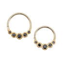 Two yellow gold seam rings with five round prong set black diamond accents in two different diameters.