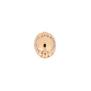 A rose gold push pin earring with a dome center and a beaded boarder. 