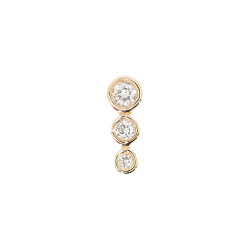 Yellow gold push pin earring consisting of three round white diamonds in bezel settings in descending sizes.