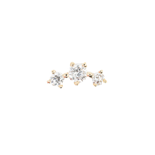 Yellow gold push pin earring consisting three prong set round white diamonds. A bigger stone is in the center, and the smaller stones are on either side connected by gold beads.