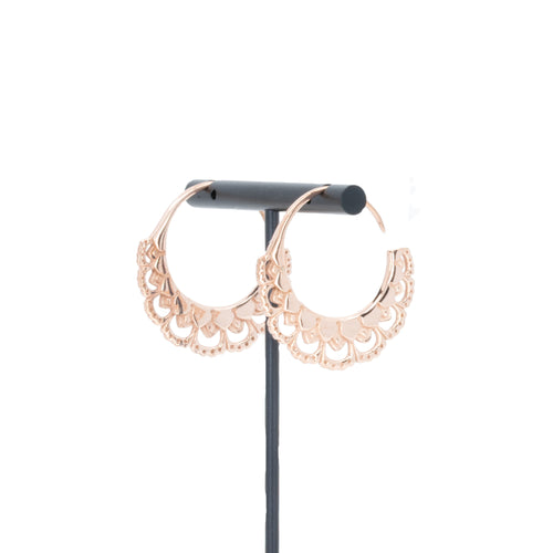 A pair of rose gold plated hoop earrings with petal details.