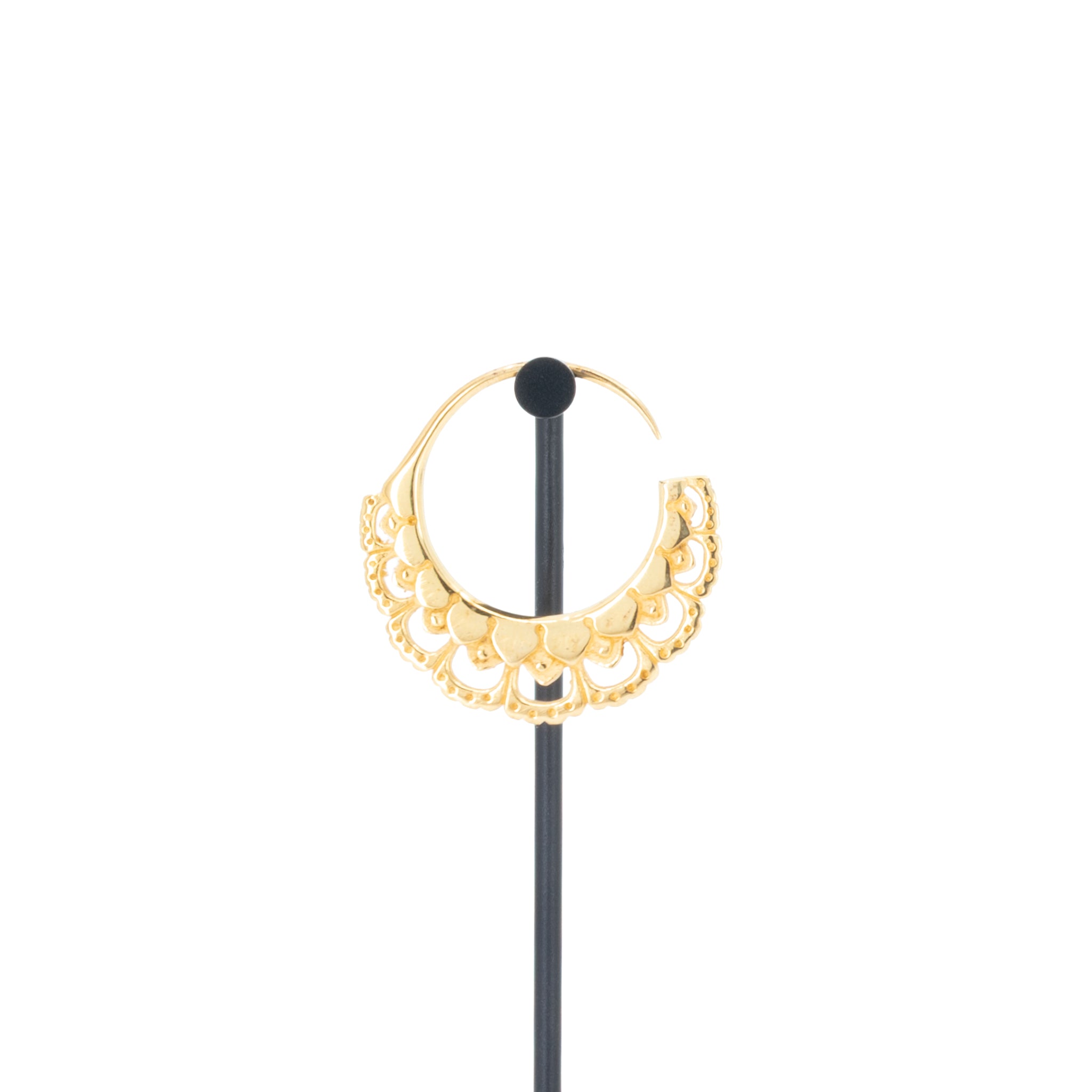 A single yellow gold plated hoop earrings with flower petal details.