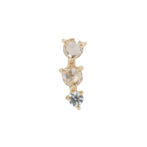 Yellow gold push pin earring consisting three prong set rose cut white sapphires set in a slight curve.