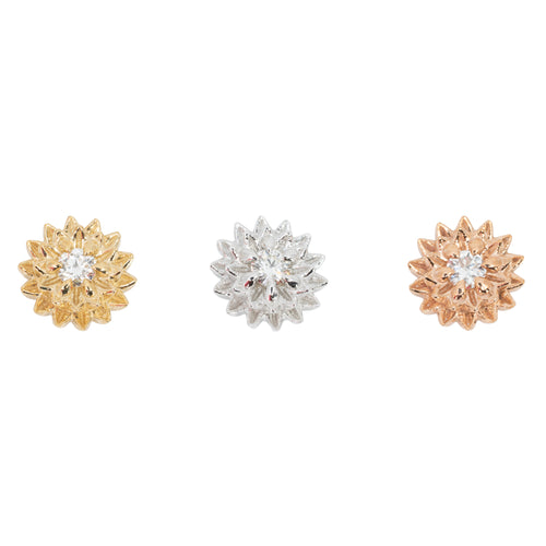 Three round diamond stud push pin earrings in a flower setting with two rows of petals. One yellow gold, one white gold, and one rose gold.