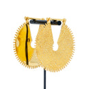 A pair of large yellow gold weights with a  textured dotted surface and scalloped edge.