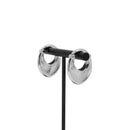 A pair of stainless steel weights in a soft teardrop shape with a laser etched line pattern on the outside.