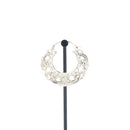 A single silver hoop earrings with decorative scroll work accents.