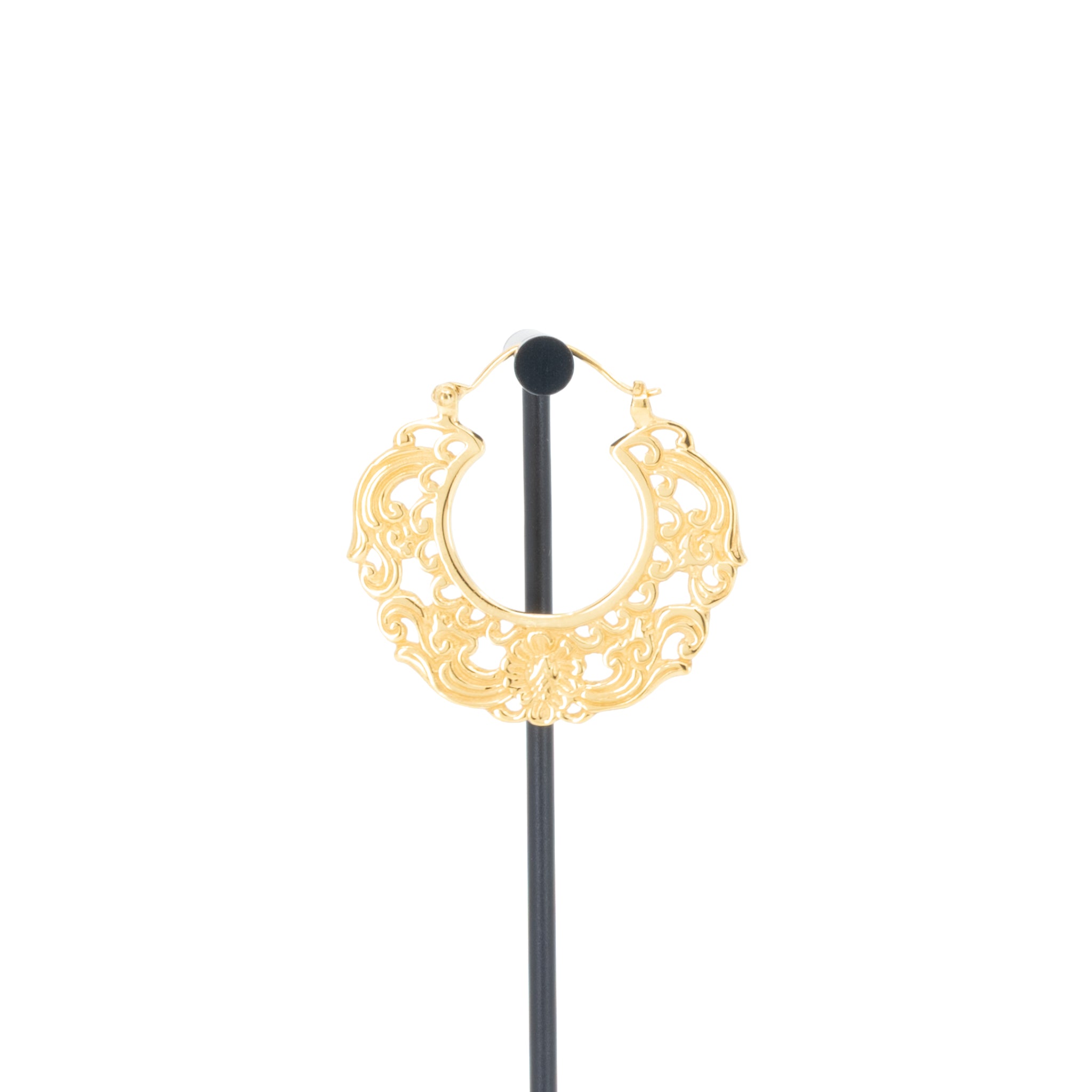 A single yellow gold plated hoop earrings with decorative scroll work accents.