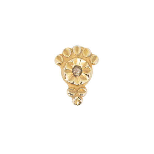 Yellow gold push pin earring with one larger textured disk and eight smaller accent disks.