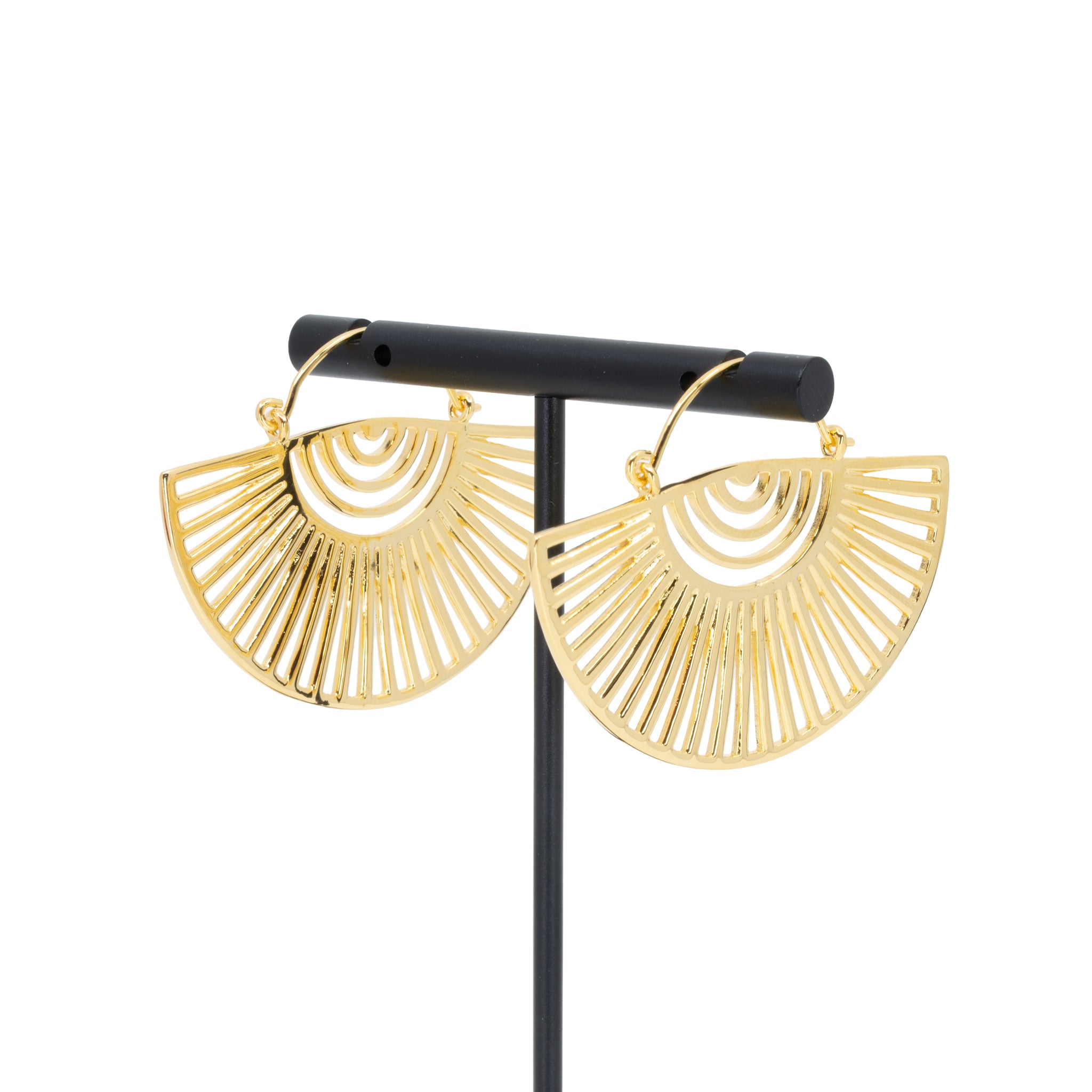 A pair of yellow gold plated hoop earrings with a half circle fan design with half circle and elongated triangle cutouts.