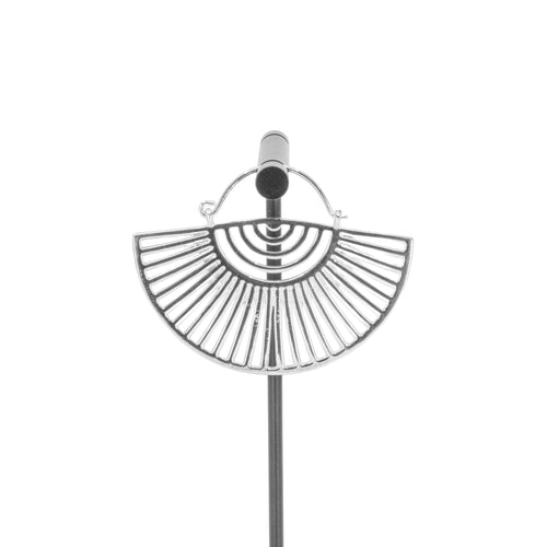 A single silver plated hoop earring with a half circle fan design with half circle and elongated triangle cutouts.