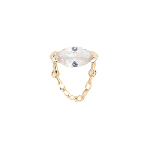 Yellow gold push pin earring with a white sapphire marquis set horizontally with two chevron prongs. A delicate chain connects below the chevrons.