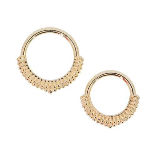 Two seam rings with a geometric decorative portion created with a rows of solid small teardrops, coming to a point in the center. One 3/8 diameter, and one 5/16 diameter.