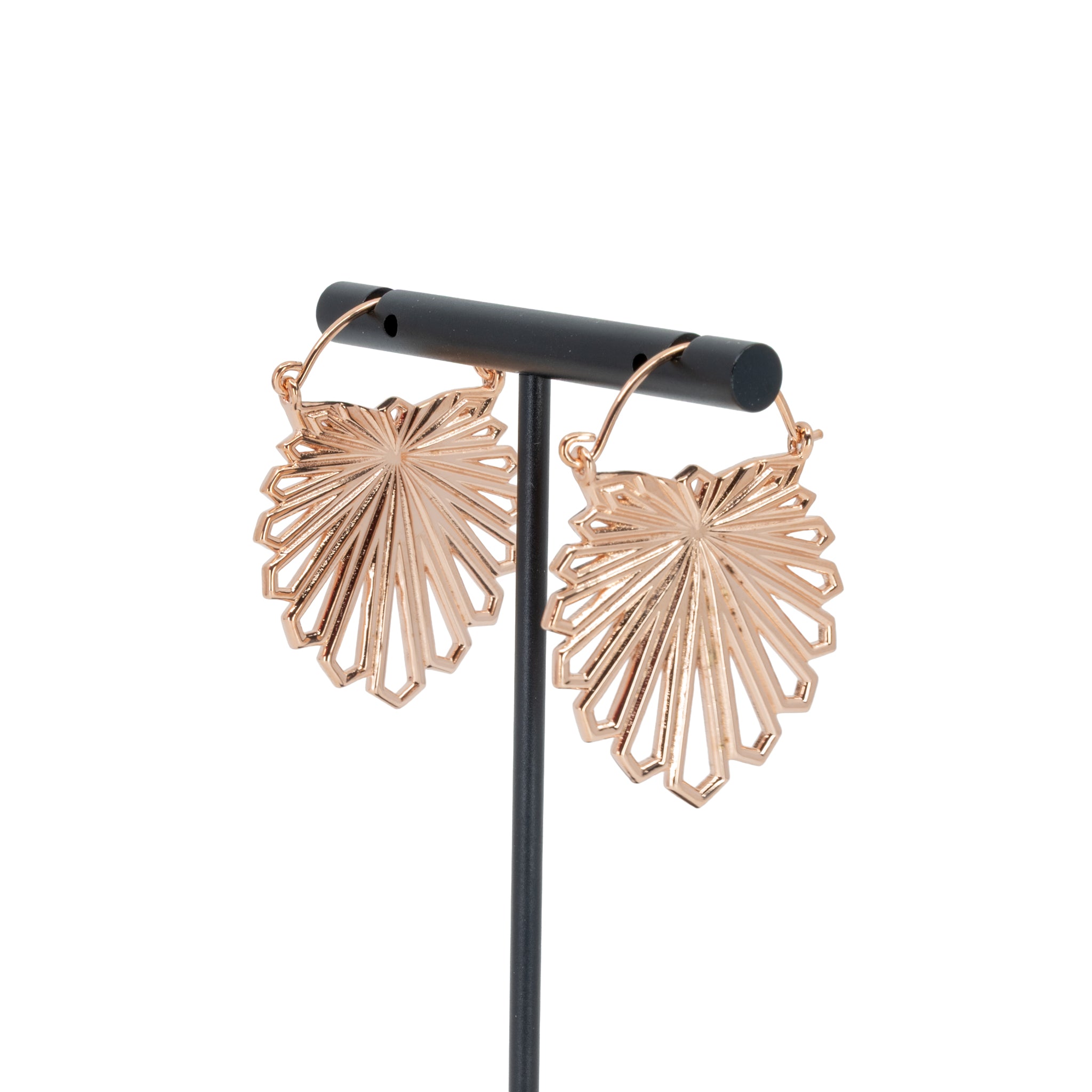 A pair of rose gold plated hoop earrings with a floral design that uses kite shapes to create the petals.