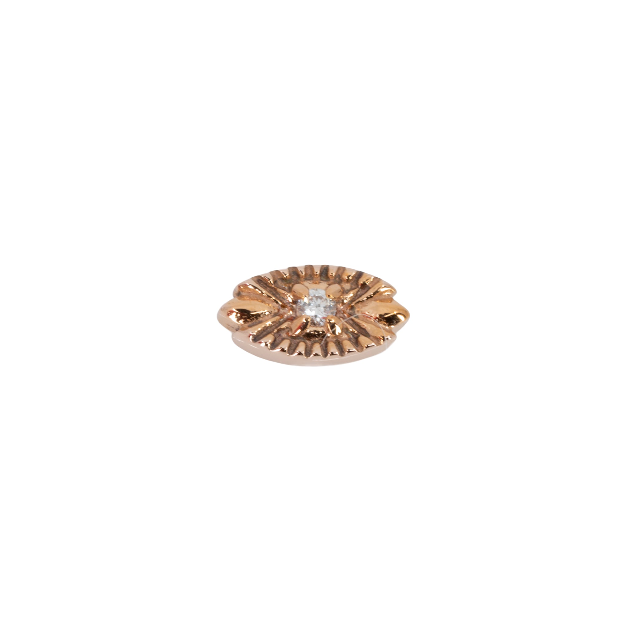 A round diamond stud push pin earring in a prong setting on a rose gold oval with laser etched accents pointing toward the center. 