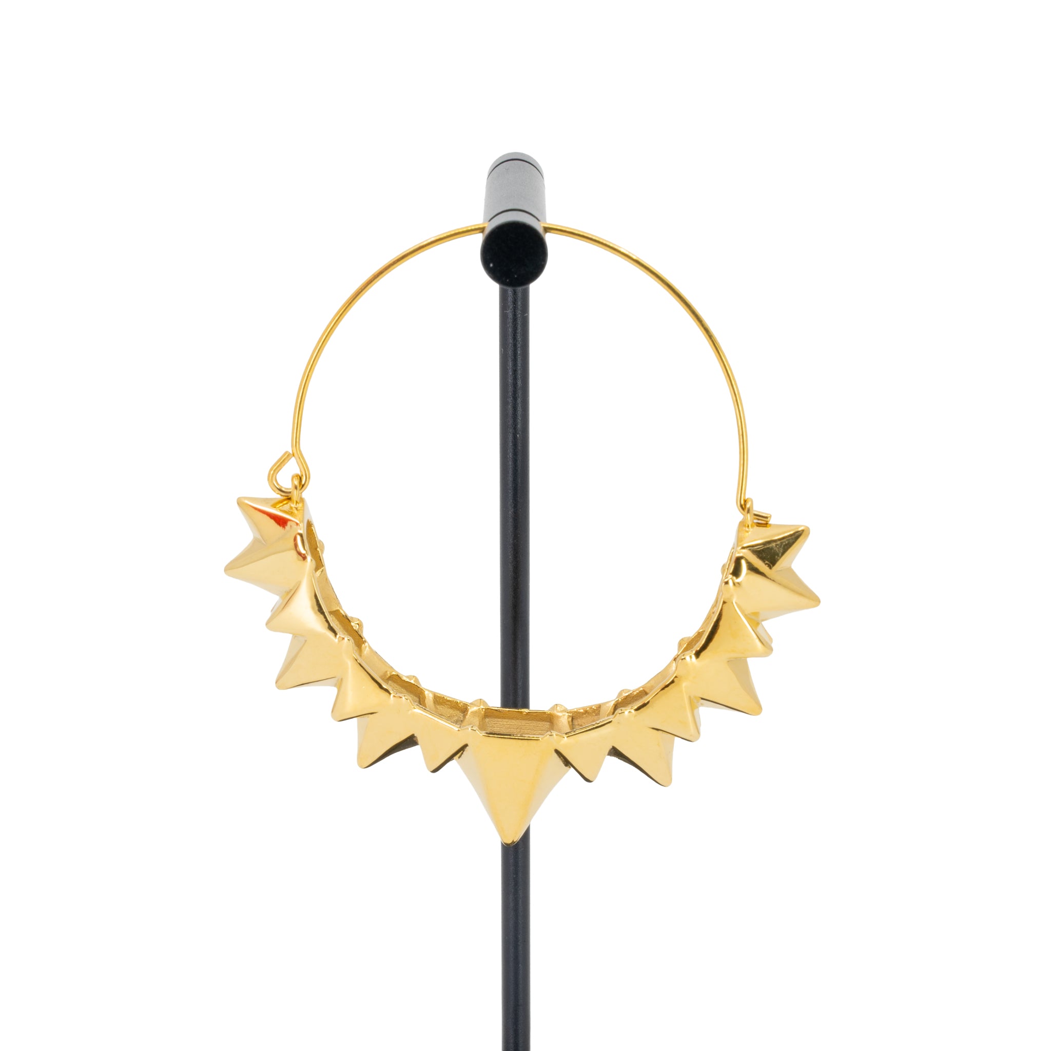 A single yellow gold plated hoop earring with the decorative portion created by varying sizes of solid triangles.