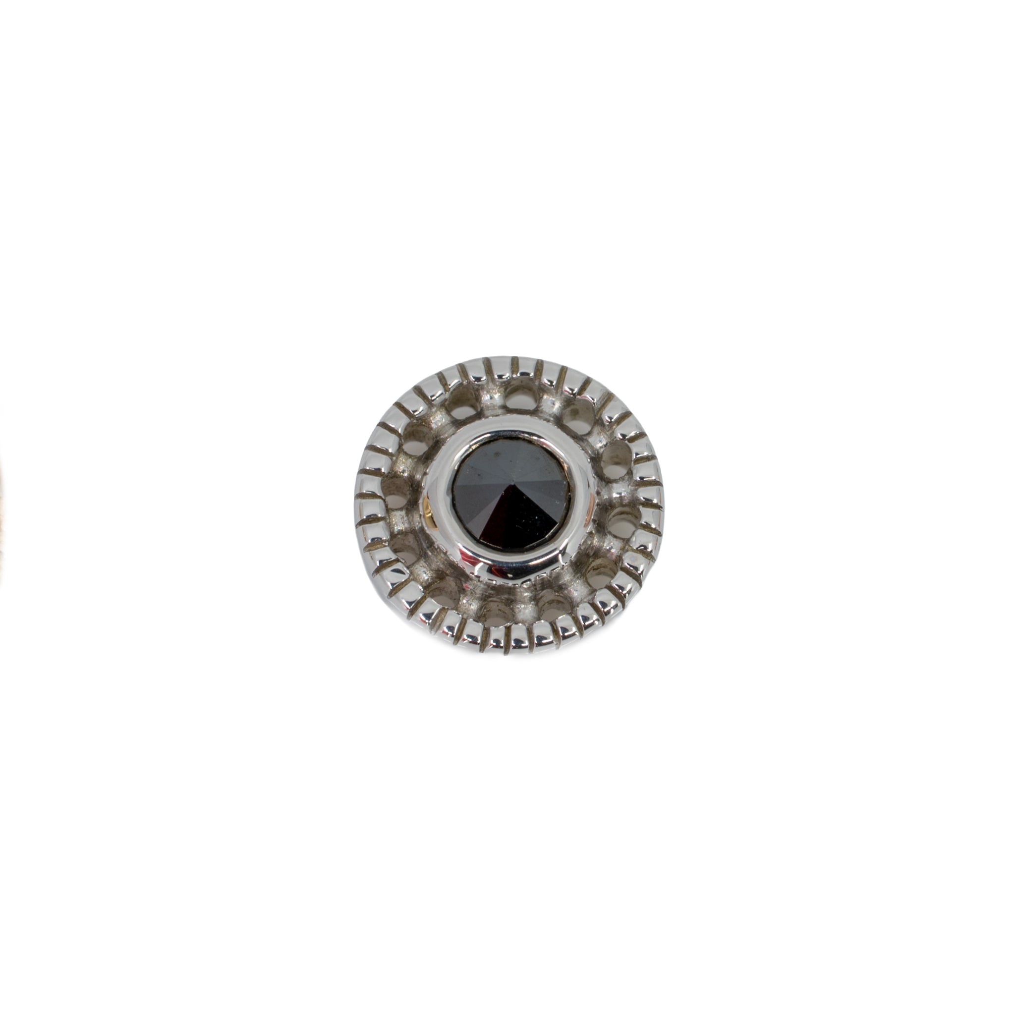 White gold push pin earring in a circular design with scalloped edges and a reverse set black diamond bezel center. 