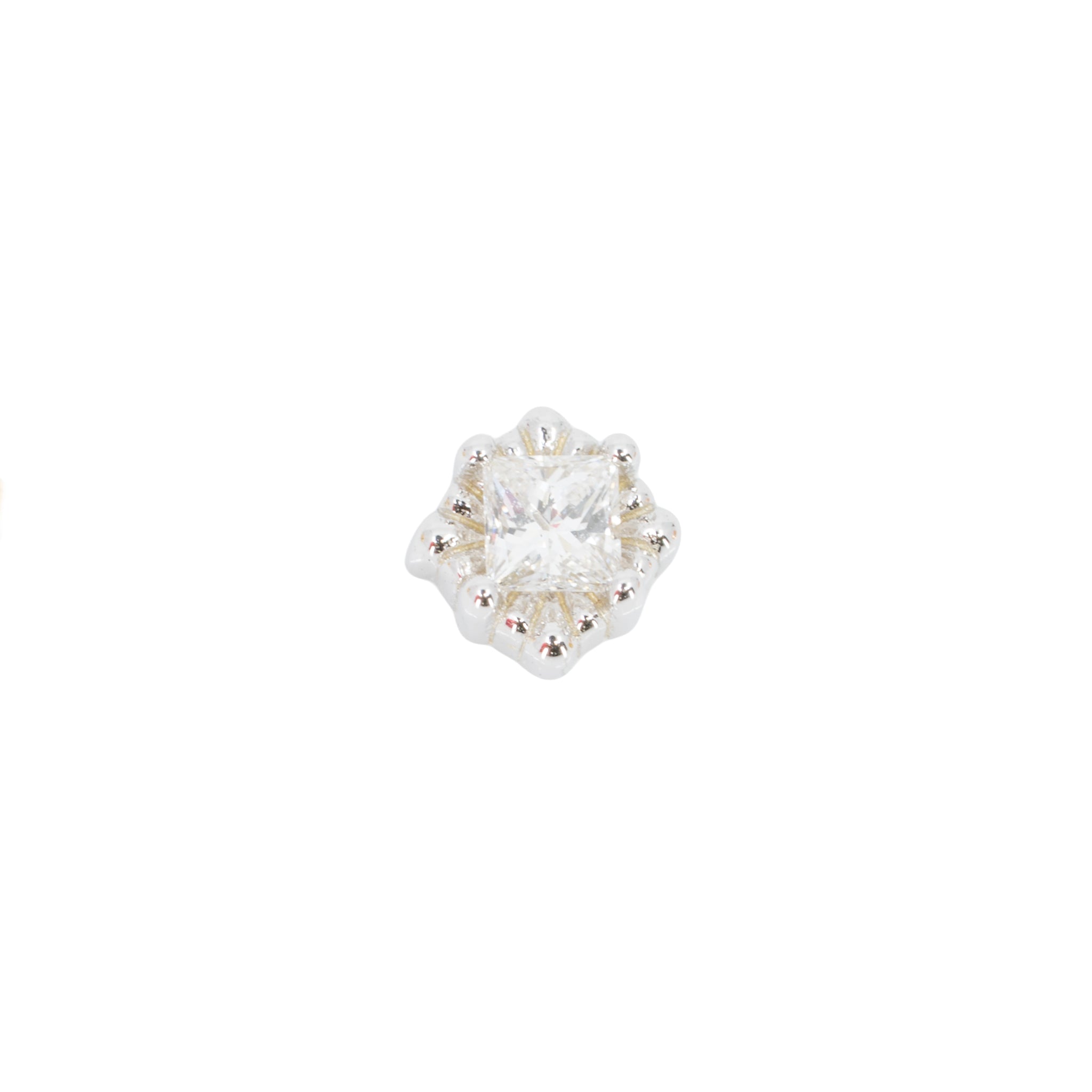 A princess cut diamond stud push pin white gold earring in a square setting with offset prongs. 