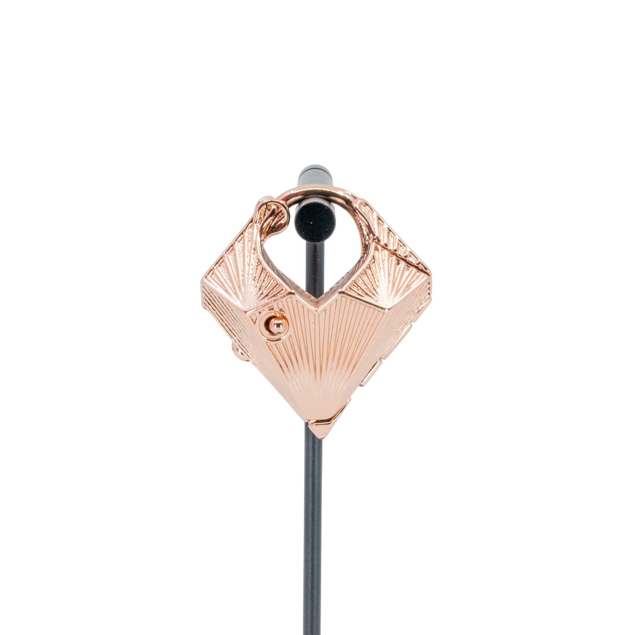 A single rose gold plated weight in a diamond shape with a laser etched geometric pattern on the outside.