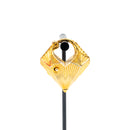 A single yellow gold plated weight in a diamond shape with a laser etched geometric pattern on the outside.