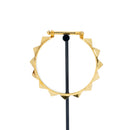 A yellow gold weight with a faceted, geometric pyramid edge design.